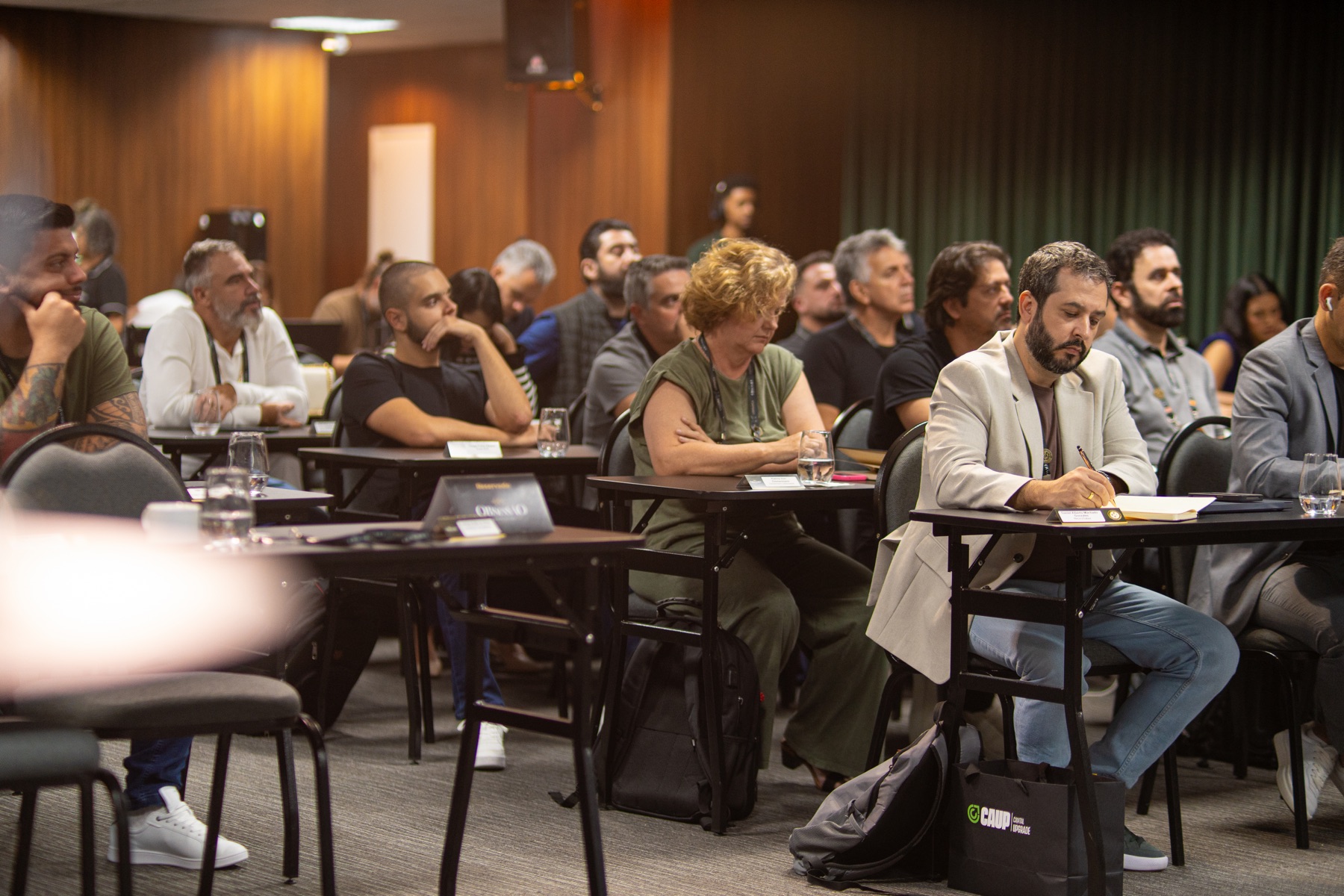 Donos de empresa em encontro do Obsessão em Negócios